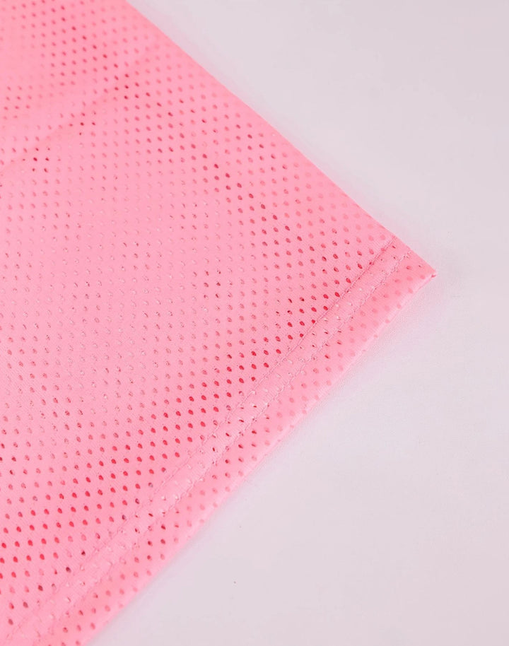 Close-up of breathable pink mesh fabric from the 23 Energetic Y2K jersey, showing its lightweight, airy texture perfect for a stylish and comfortable retro look.