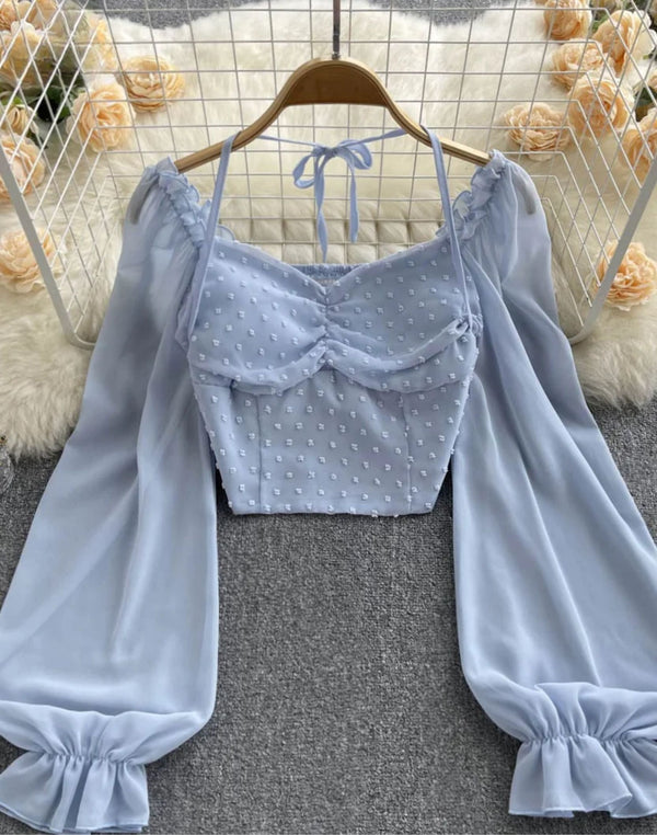Pastel blue Ethereal Ruched Off-Shoulder Top with ruched bodice, embroidered dots, and long semi-transparent sleeves, ideal for summer fashion, Harajuku, and Korean style, shown on a hanger.