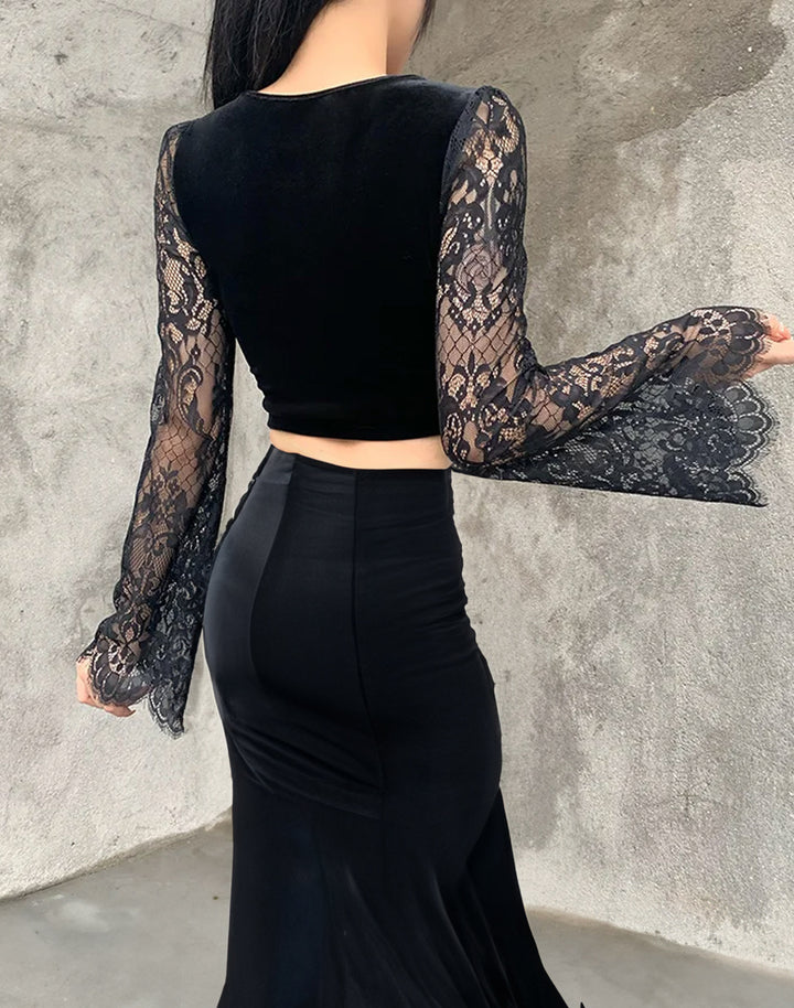 Model showing the back of the gothic velvet top