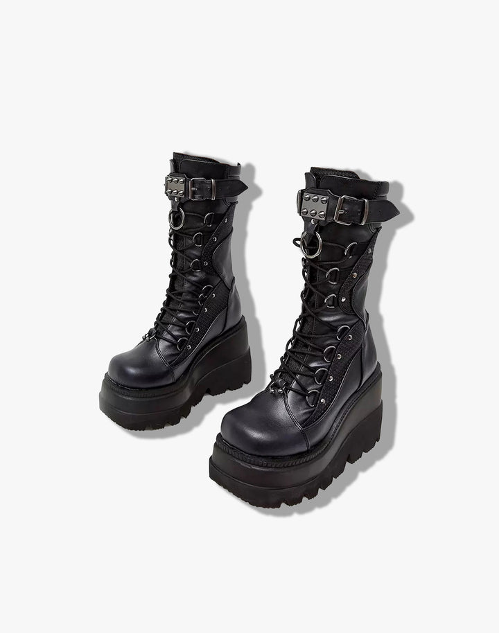 Side view of Goth Spike Boots, emphasizing the 8 cm heel and customizable strap with bold spikes
