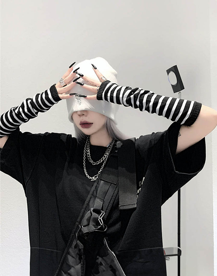 Model Wearing Black White Striped Arm Warmers
