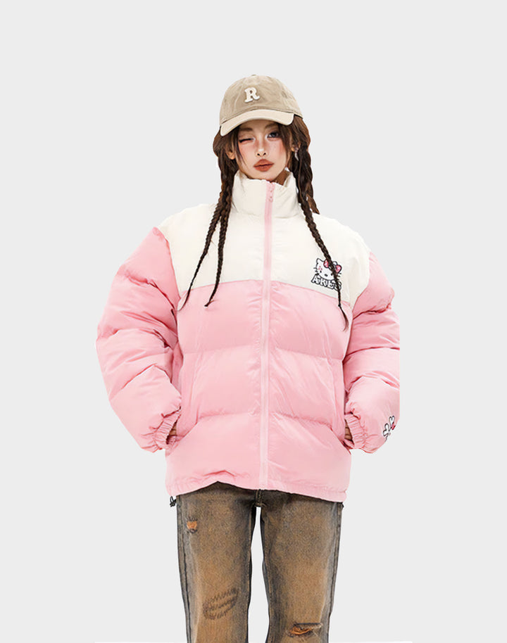 Stylish model wearing the Pink Hello Kitty Puffer Jacket, showcasing the chic cuff detail.