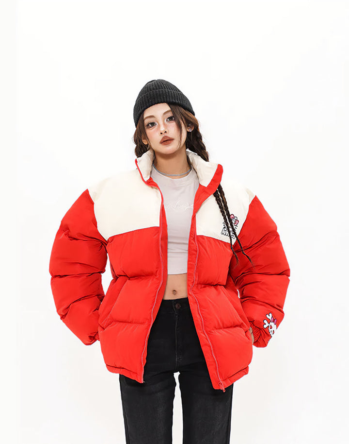 Striking model in the Red Hello Kitty Puffer Jacket, highlighting the collar detail and inside features.