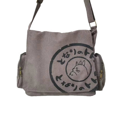 Gray Totoro messenger bag with black Totoro graphic and Japanese text.