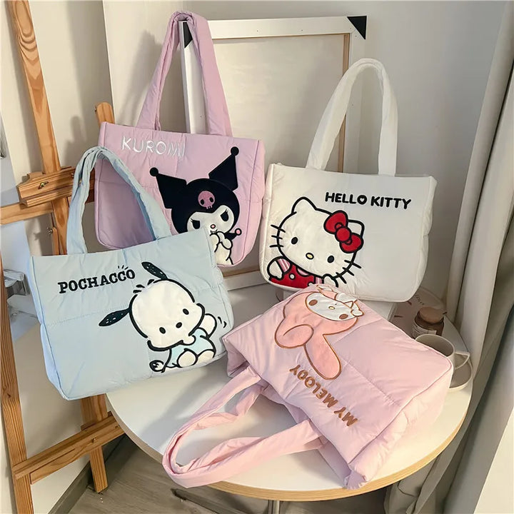 Cute Sanrio puffer bags featuring Hello Kitty, Kuromi, My Melody, and Pochacco, perfect for back to school 2024. Available at Street Kawaii