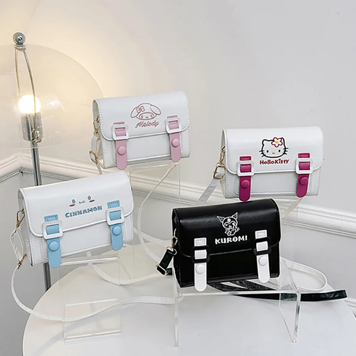 Display of Sanrio character messenger bags: Hello Kitty, My Melody, Cinnamoroll, and Kuromi, showcasing their cute designs and adjustable straps.