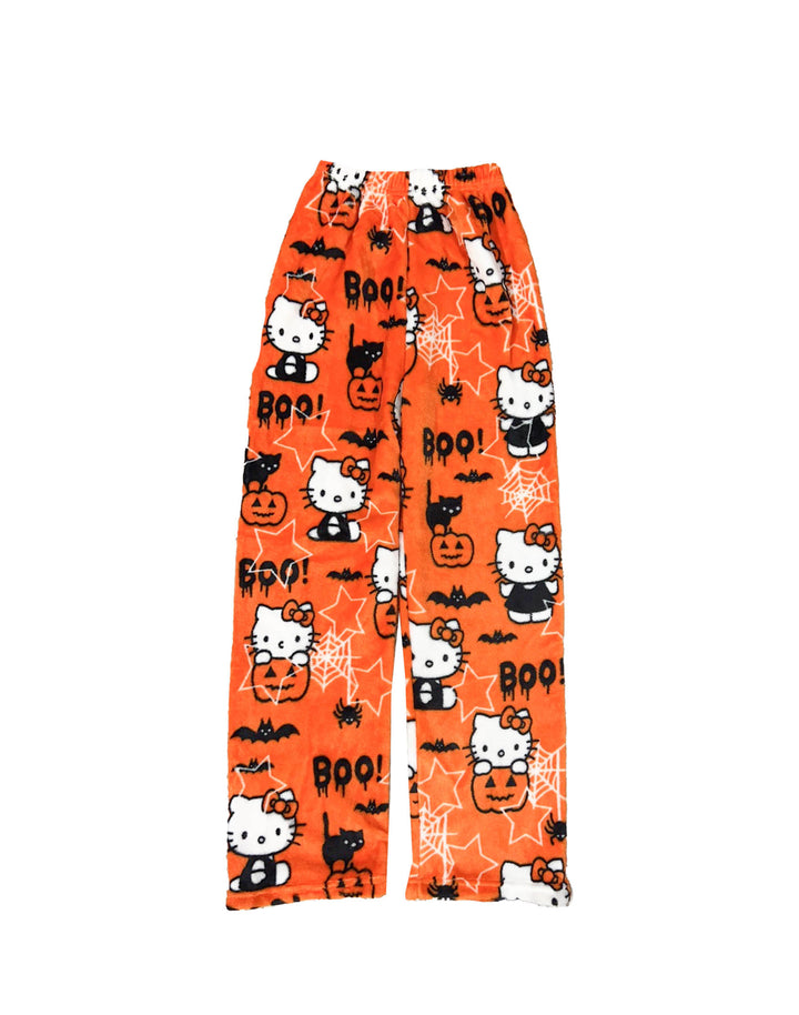 Hello Kitty Halloween pajama pants with orange background, featuring Hello Kitty, pumpkins, bats, and Boo! text, perfect for kawaii fashion and Halloween clothes.