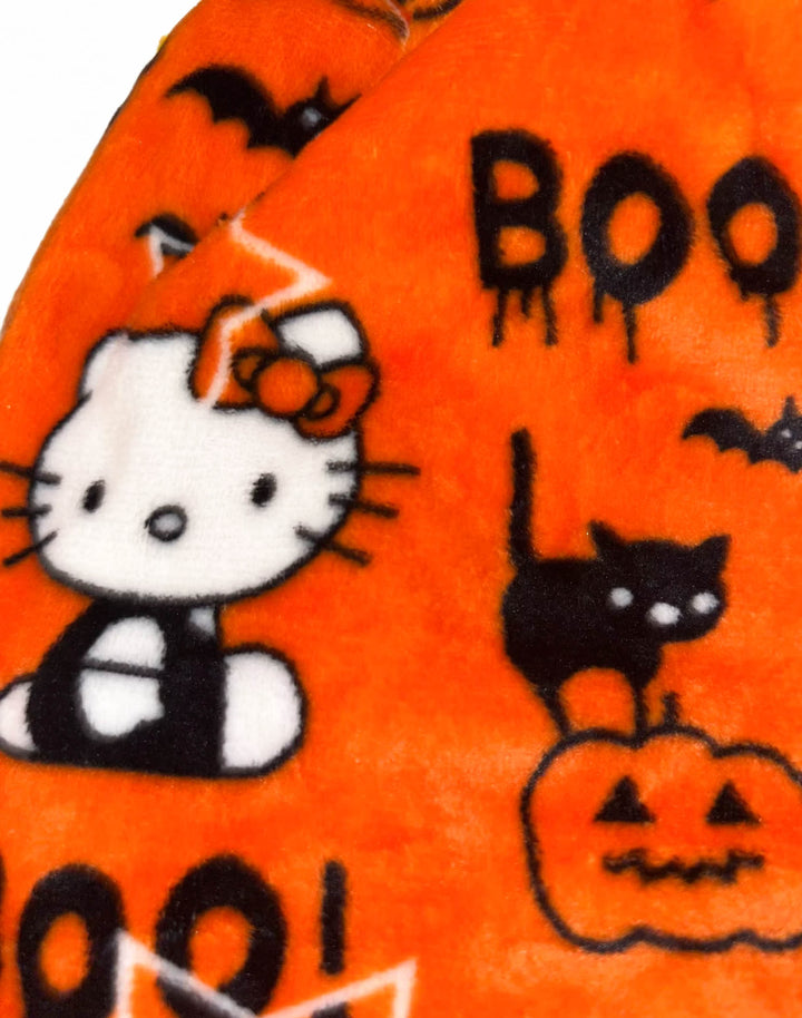 Detailed view of Hello Kitty Halloween pajama pants showing Hello Kitty and a black cat with Halloween pumpkins and Boo! text in a kawaii style.