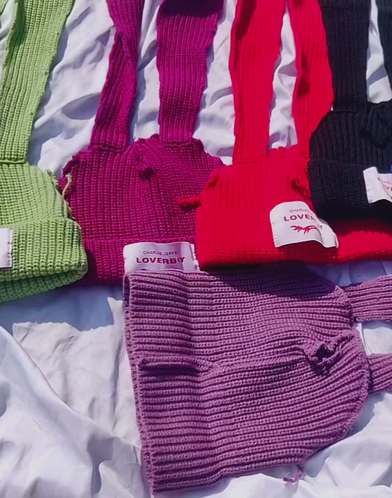video showing a collection of Bunny Ears Style Beanies in various colors, emphasizing the versatility and playful charm of this kawaii fashion accessory