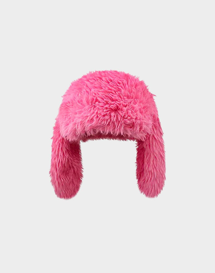 Pink kawaii winter beanie with playful bunny ears isolated on a white background